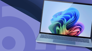 Surface Laptop with screen open on purple background